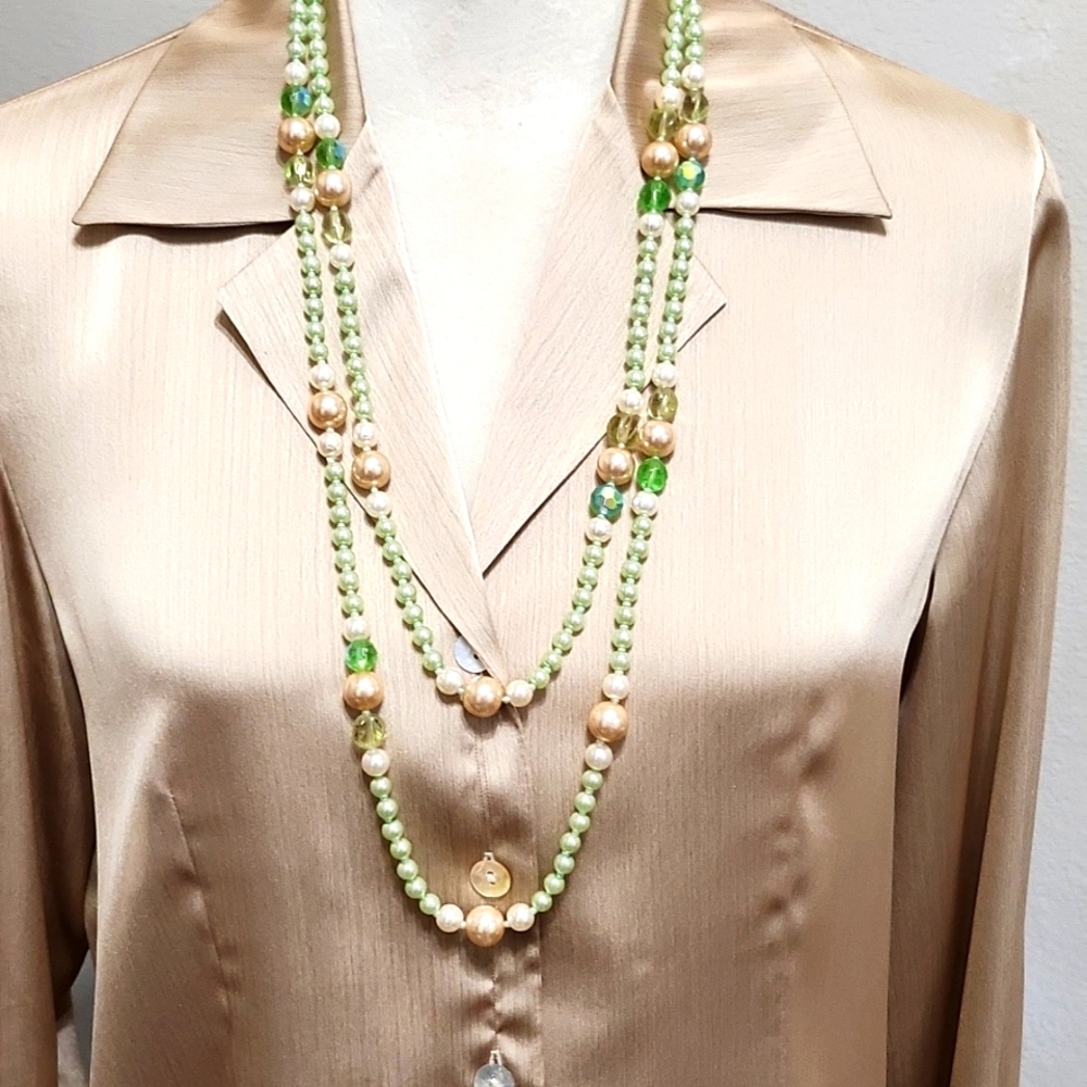 Like new green and tan colored faux pearls